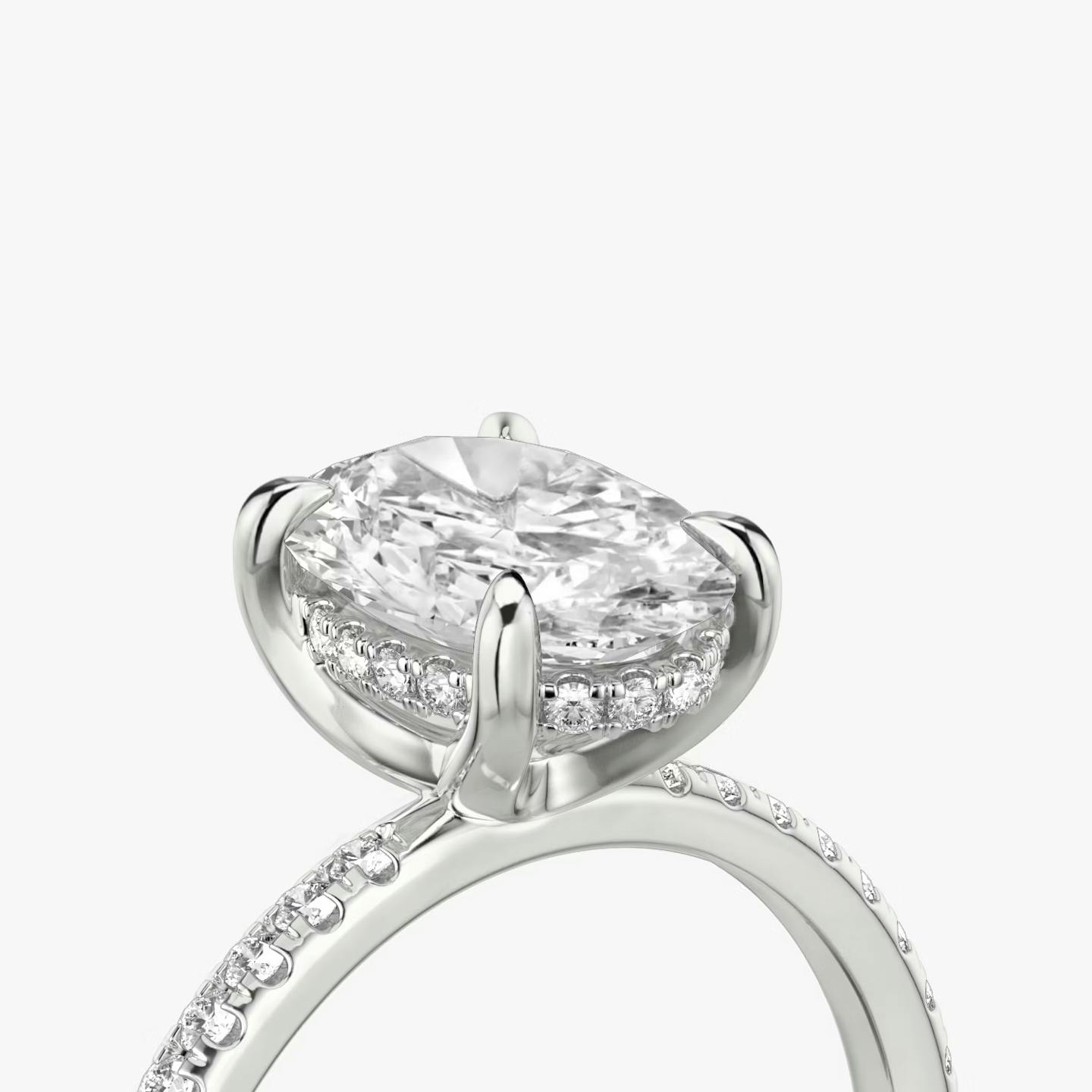 The Classic Hidden Halo | Oval | Platinum | Band: Pavé | Prong style: Plain | Diamond orientation: vertical | Carat weight: See full inventory