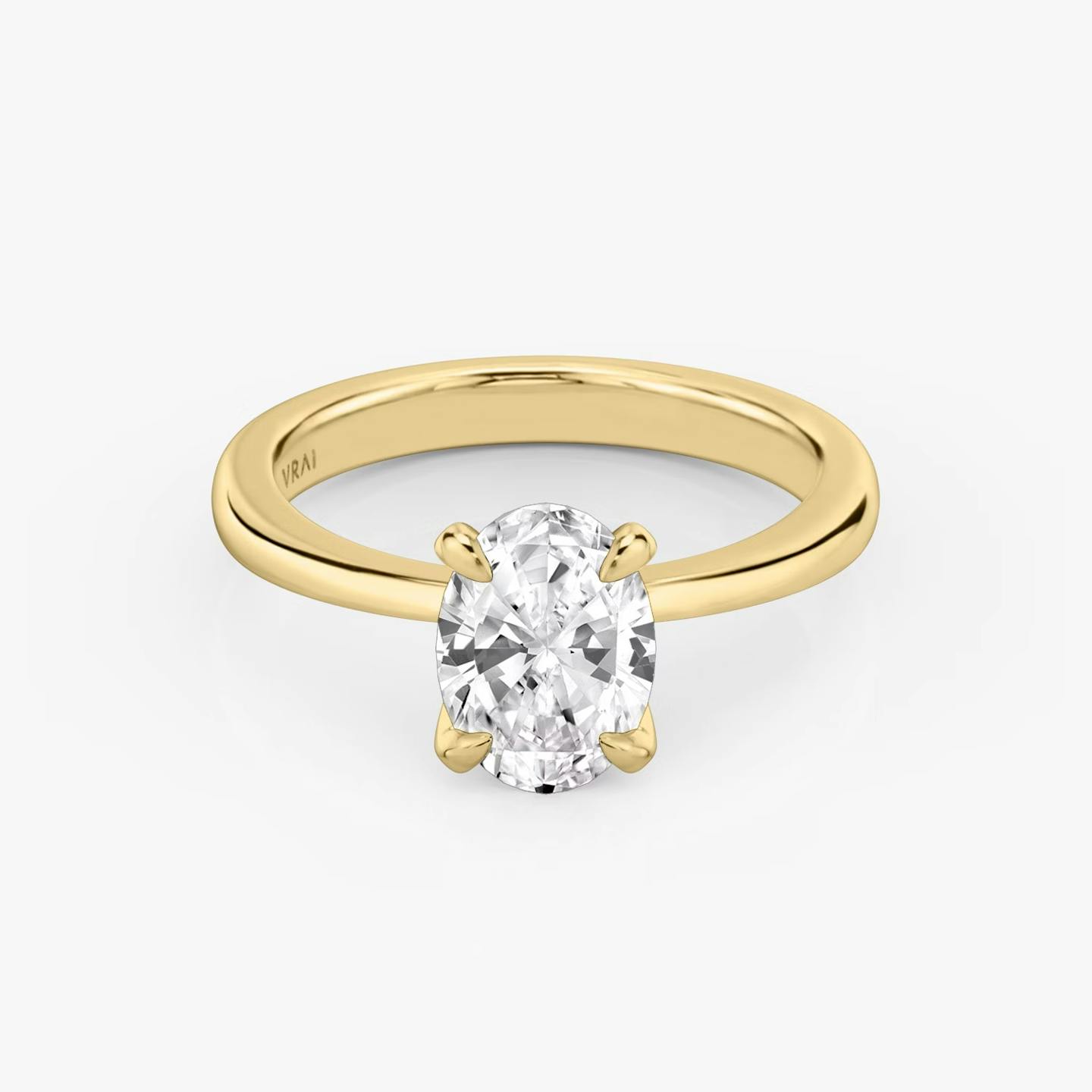 The Tapered Classic | Oval | 18k | 18k Yellow Gold | Band: Plain | Diamond orientation: vertical | Carat weight: See full inventory